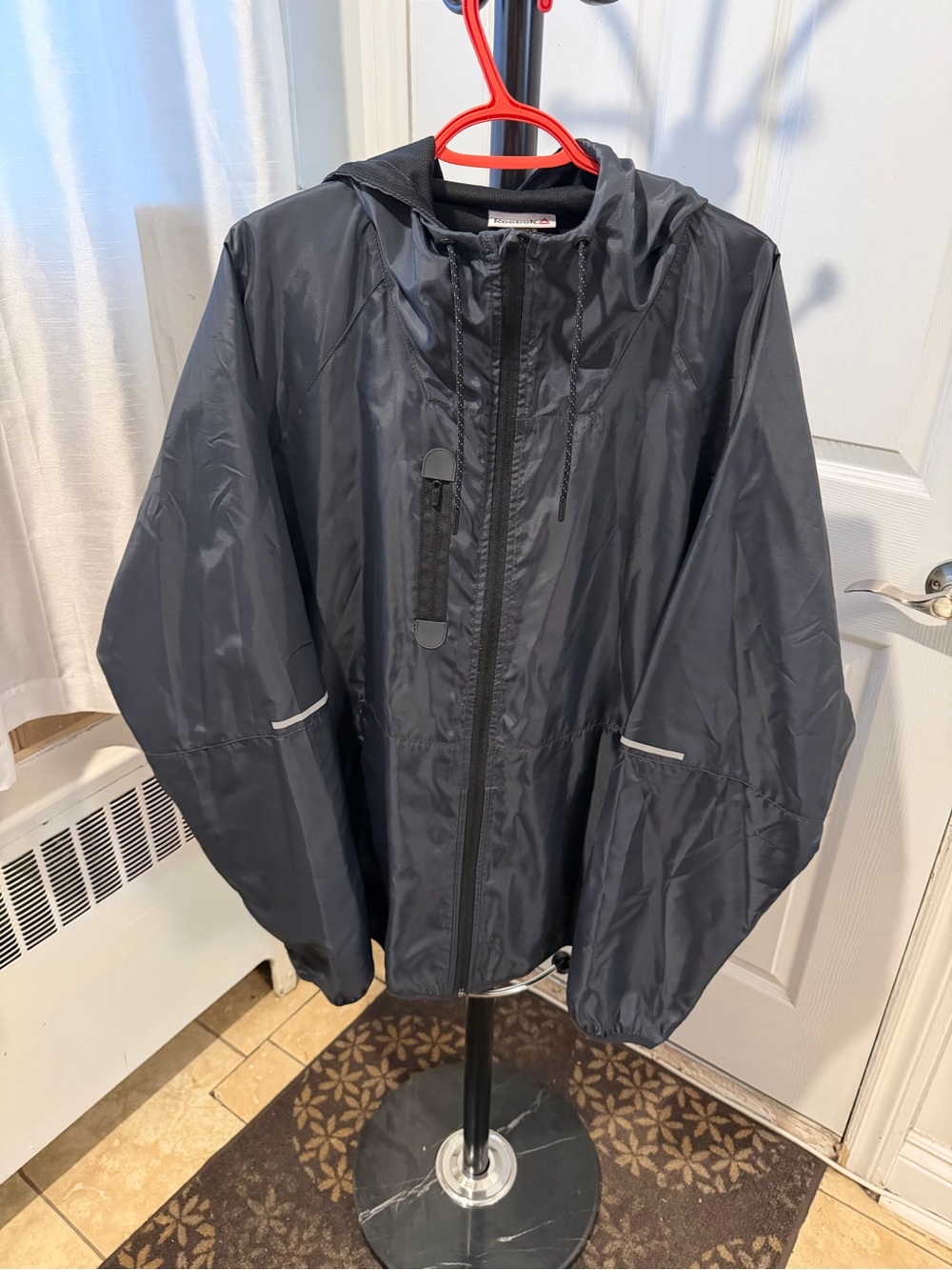 Reebok Black Hooded Windbreaker with Reflective Trim